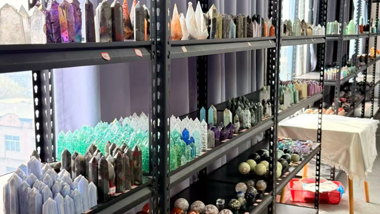 Shelves of pointed forms and polished spheres in several visible sizes and appearances.