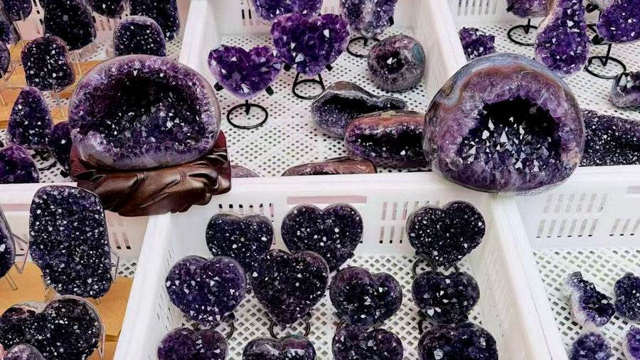 Purple crystalline display pieces with clustered and cavity-shaped surfaces for online product presentation.