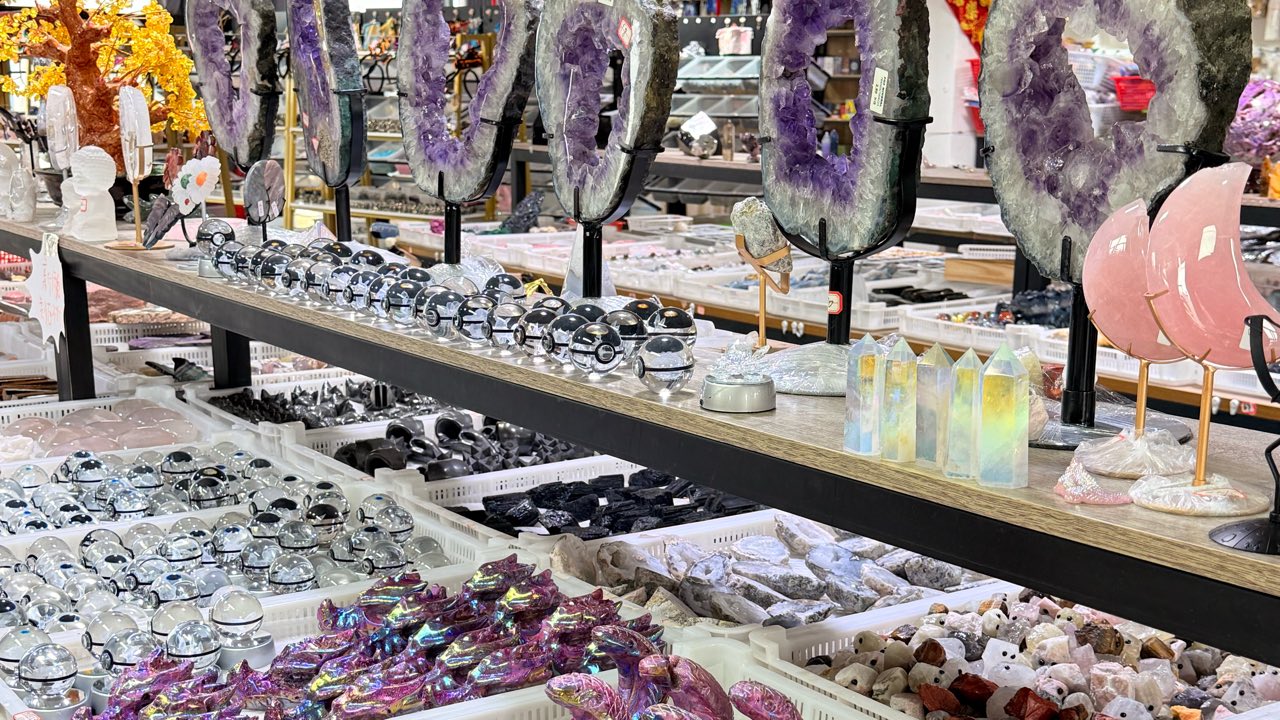 Assorted products in multiple polished, pointed, spherical, crescent-shaped, and cavity-shaped forms.