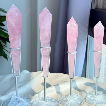 Detail view of rose quartz wand and display stand