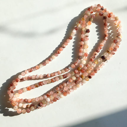 Mixed crystal bead strand