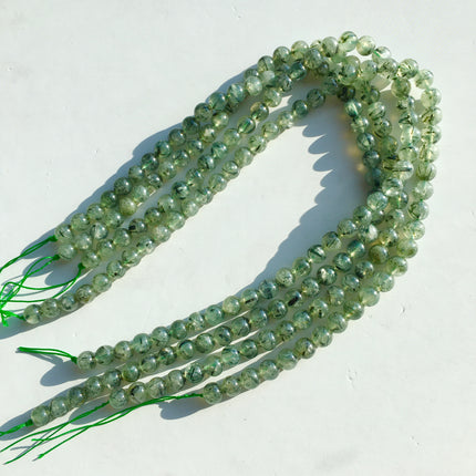 Mixed crystal bead strand