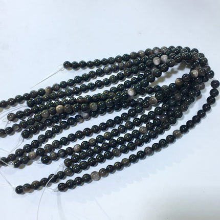 Mixed crystal bead strand
