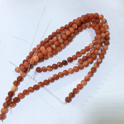 Mixed crystal bead strand
