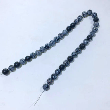 Mixed crystal bead strand