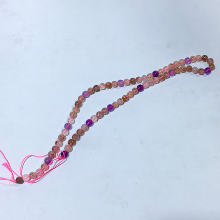 Mixed crystal bead strand