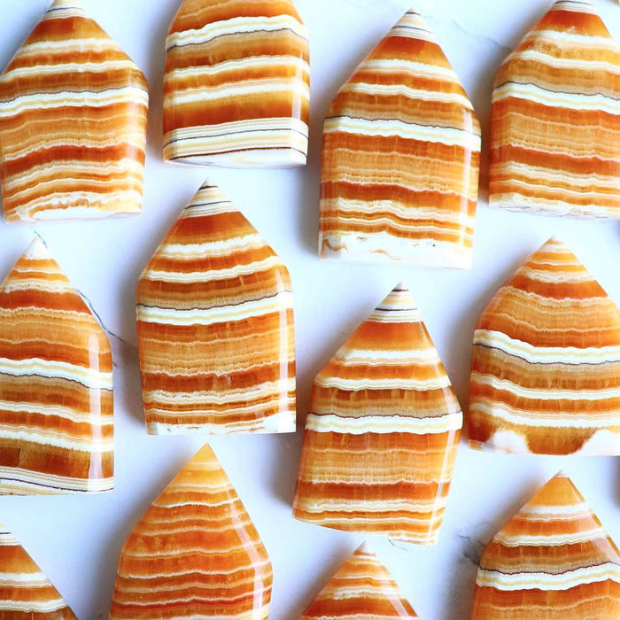 Crystal freeform-orange calcite stripe freeform for wholesale price