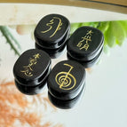 black obsidian palm stone set