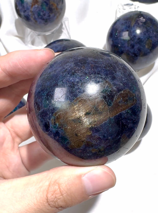Crystal sphere Iolite with emerald and mica sphere