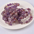 Amethyst garden bead bracelet with purple inclusions